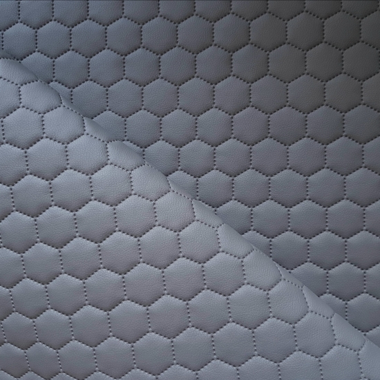 Tkanina tapicerska Ekoskóra pikowana heksagony szara